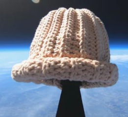 Dog wif hat beanie in space